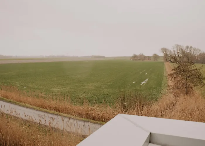 Haus Ostwind - An Den Puetten 12a Vakantiehuis Tossens
